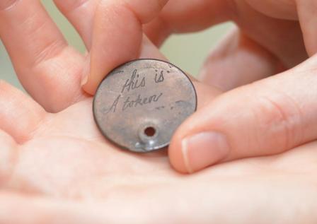 Copy (2) of Copper inscribed token 'this is a token' C Foundling Museum, London
