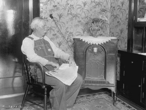 Farmer listening to radio - courtesy U.S. National Archives