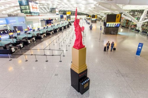 The Statue of Liperty: As part of its new month-long festival of lipstick Heathrow has today unveiled a two-storey replica of the Statue of Liberty in Terminal 5 made using classic red lipstick - the most popular lipstick shade currently being worn by New Yorkers and Big Apple bound passengers.