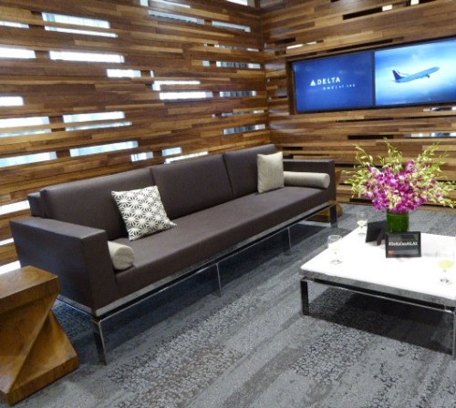 05_A walnut wall offers privacy, but lets light in, at the Delta ONE lounge at LAX.