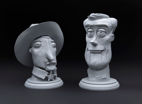 Early Woody and Woody - cast urethane resin Courtesy of Pixar Animation Studios  - 