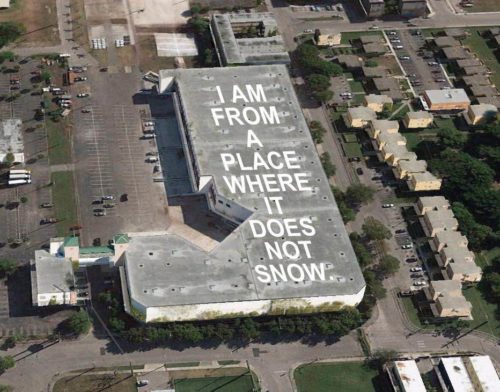 Mock up of the poem by 3rd grader Nieema Marshall being painted on a rooftop near Miami International Airport