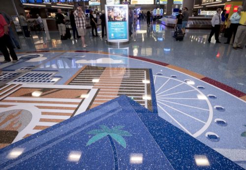A mosaic mural depicting past and present Las Vegas landmarks is unveiled in the Teminal 1 Baggage Claim at McCarran International Airport on Thursday, Sept. 8, 2016. CREDIT: Mark Damon/Las Vegas News Bureau