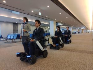 Airport amenity test: self-driving wheelchairs + collision-alert suitcases