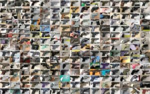 How many firearms did TSA find at airport checkpoints in 2019?