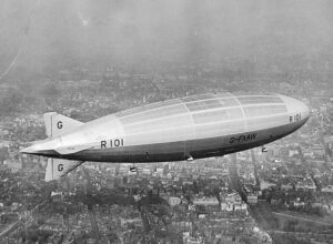 2JPTBP0 The ill fated British airship R101, which crashed in France on its first flight, killing 48 people. The accident meant the end of the British airship development program. Here it is seen during a test flight over Westminster, London in 1929